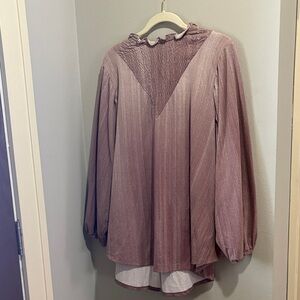 Elegance meets comfort in this New LuluRoe Long Sleeve Clara Blouse